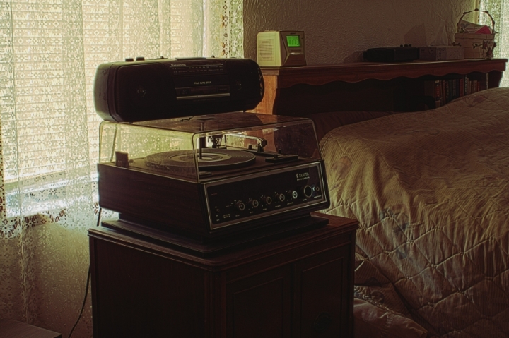 Bedroom with outdated music players